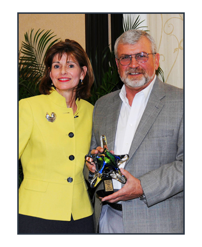 Don Yousey (right) received the Levine Award for Local Innovation in Public Health from Dr. Devlin